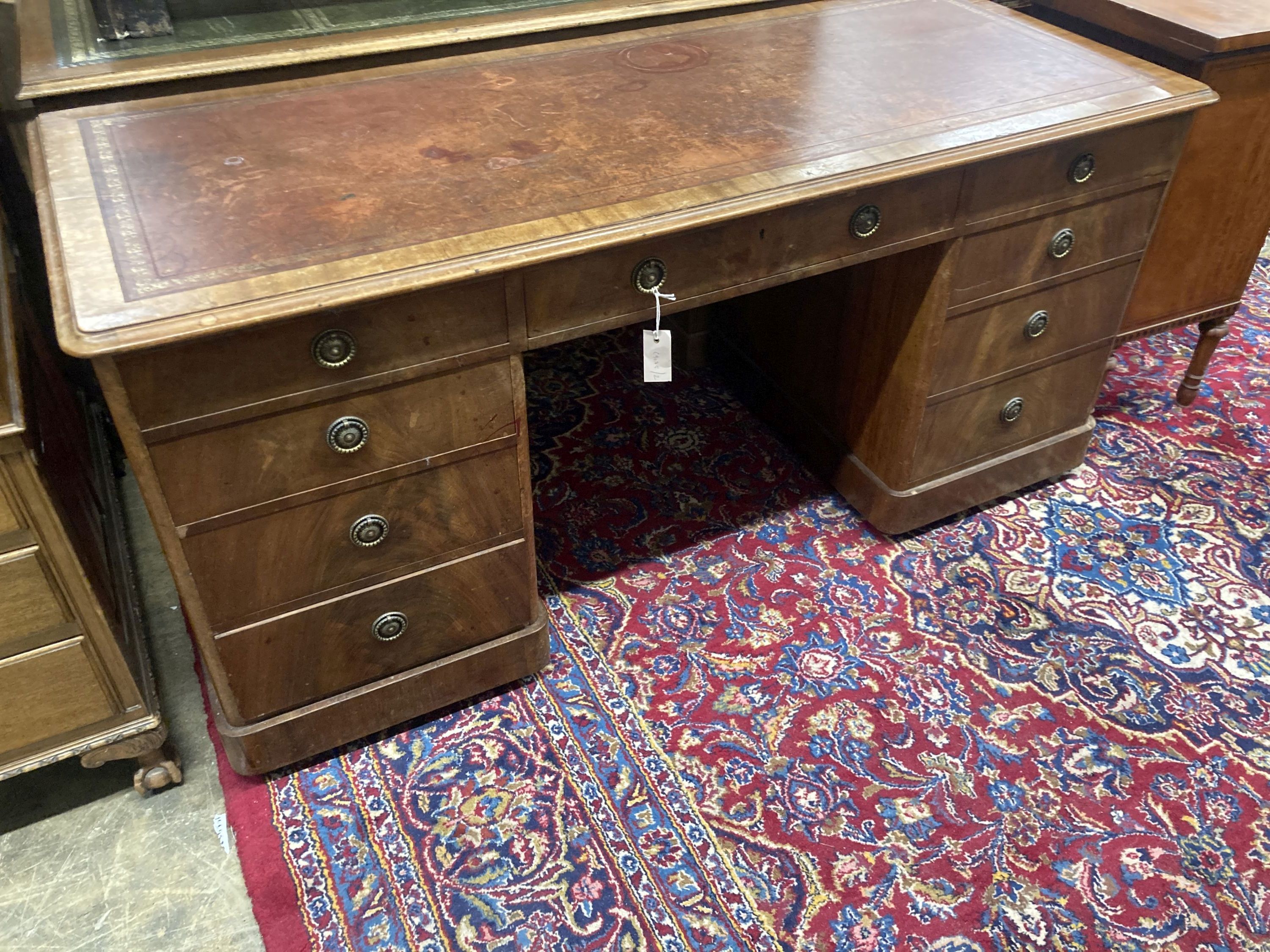 A Victorian mahogany kneehole desk, width 156cm, depth 64cm, height 73cm